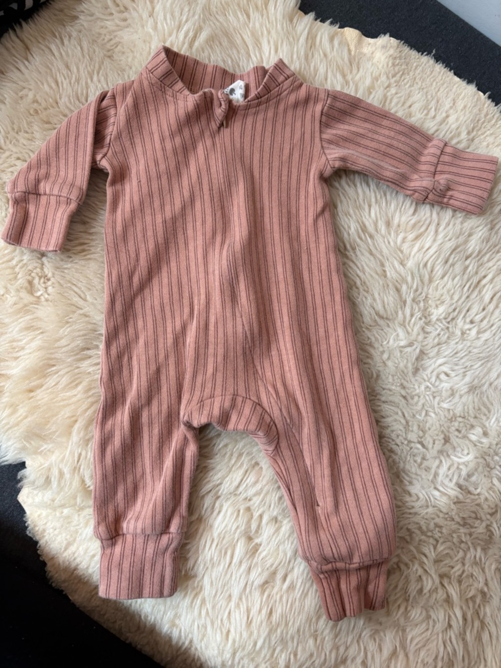 Kate Quinn - footless sleeper in terracotta brown